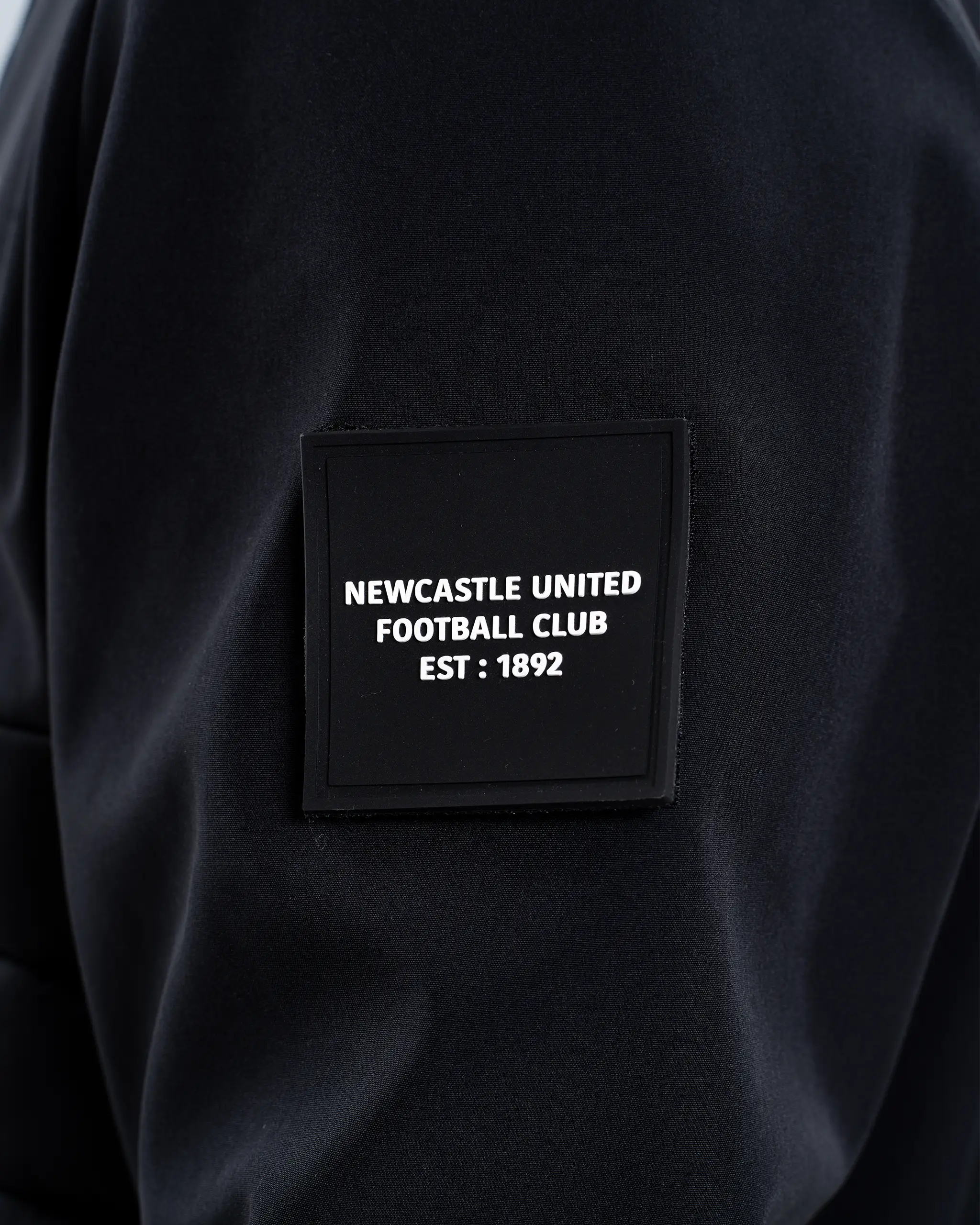 Newcastle United Black Hooded Hybrid Jacket - Image 6