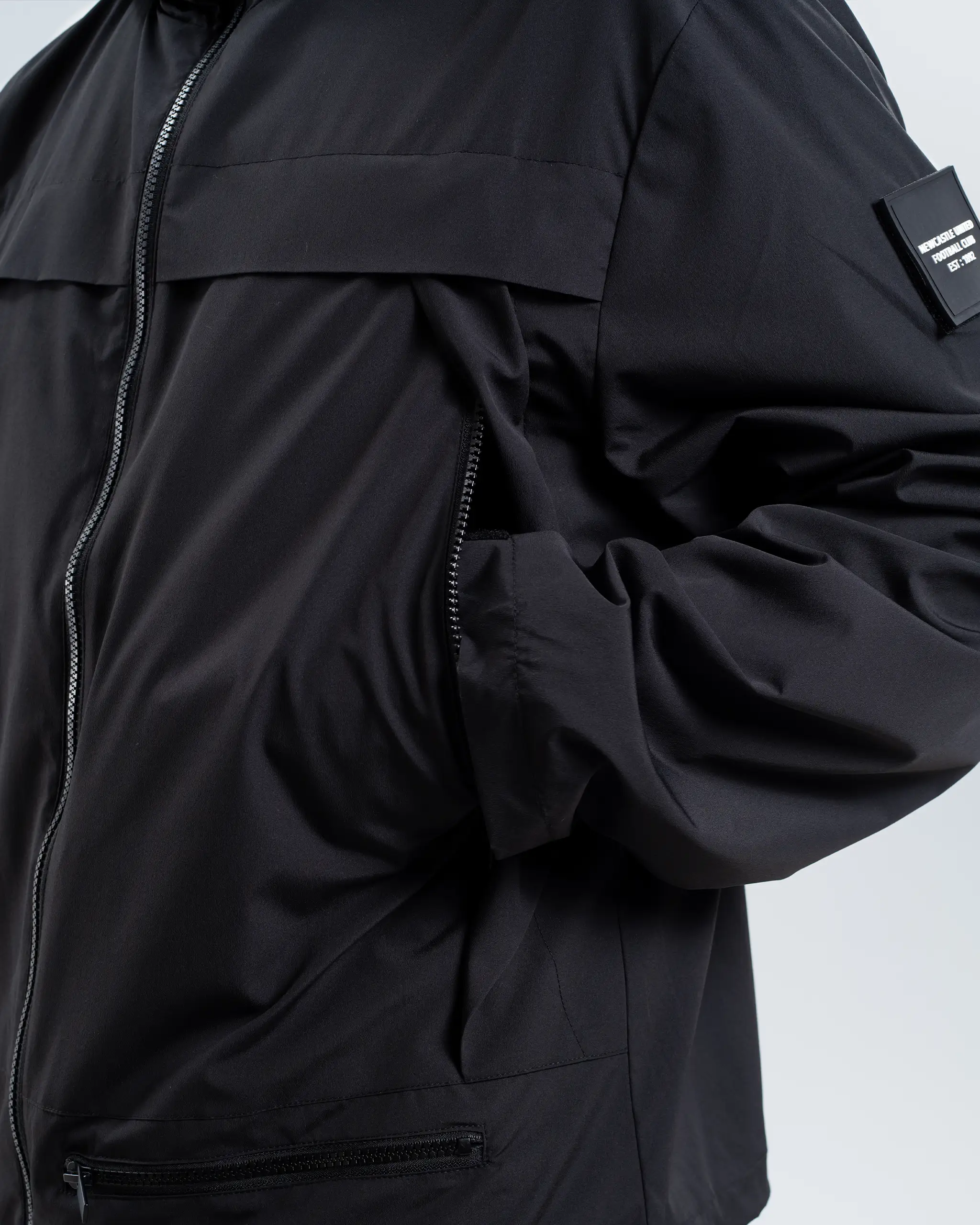 Newcastle United Black Hooded Shower Jacket - Image 3