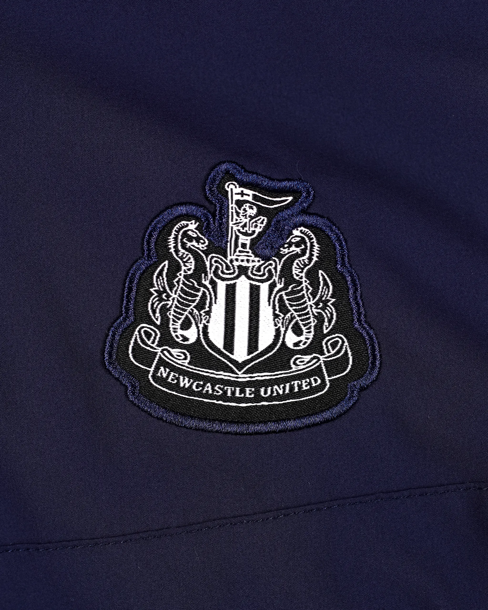 Newcastle United Kids' Navy Windbreaker Jacket - Image 4