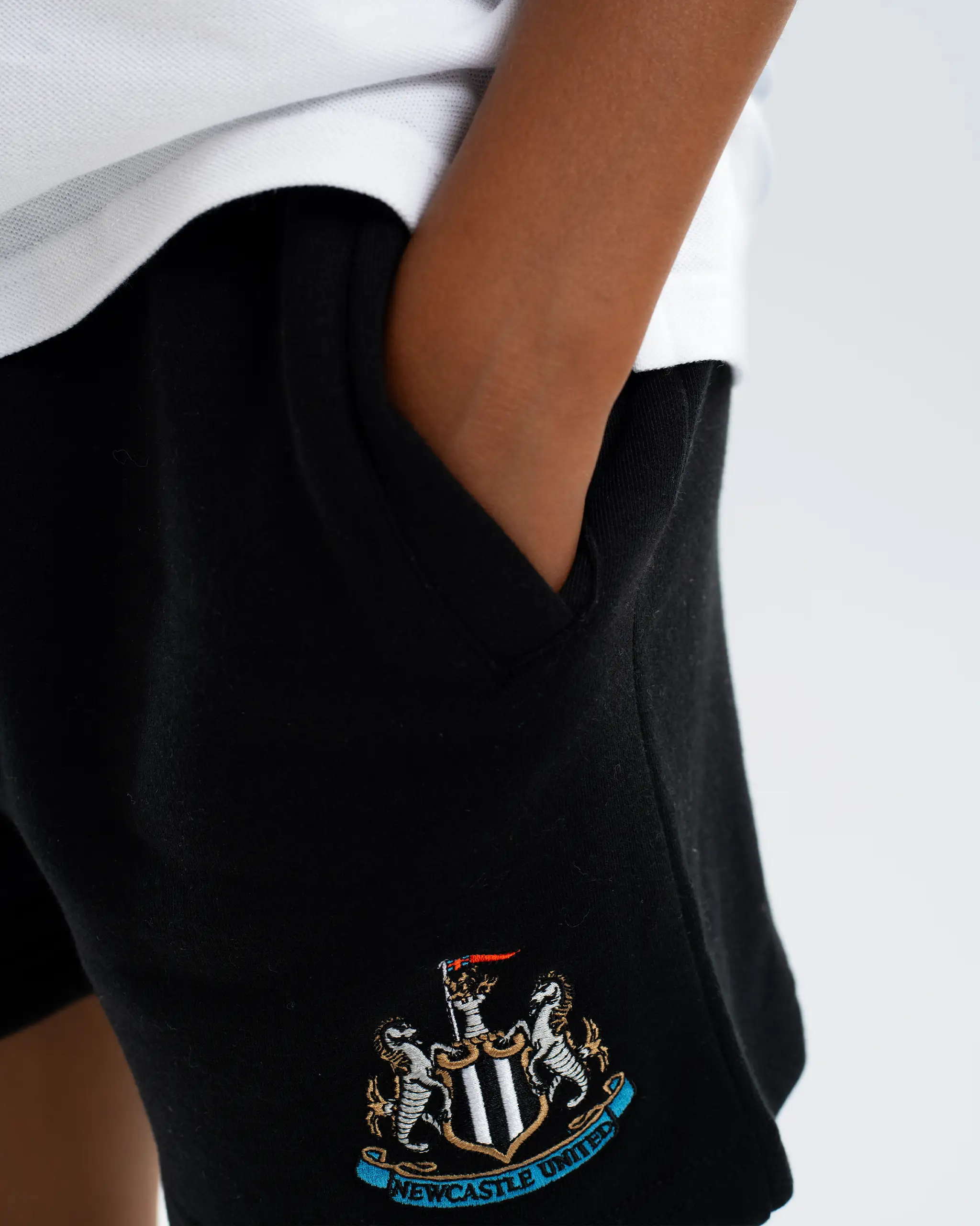 Newcastle United Kids' Essentials Range Black Fleece Shorts - Image 2