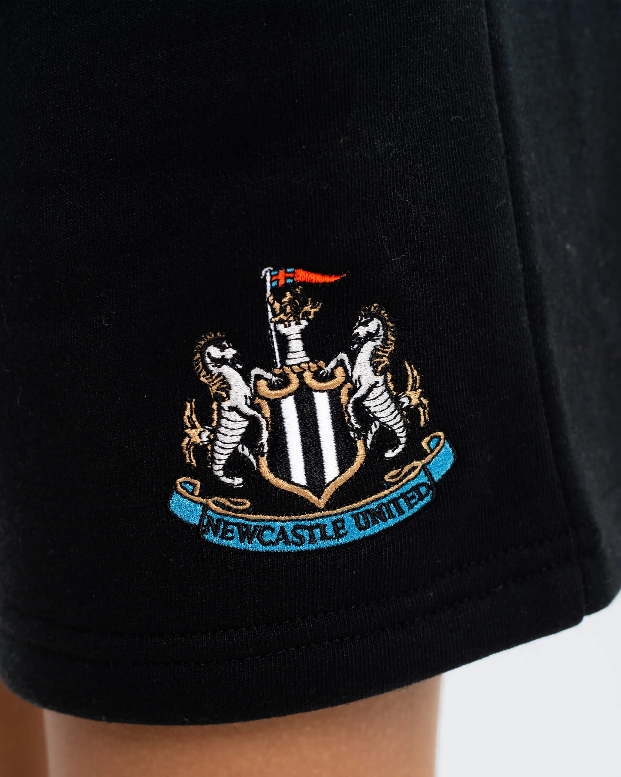 Newcastle United Kids' Essentials Range Black Fleece Shorts - Image 3